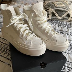 Converse high tops in Cruise White (off white). Only worn one time!